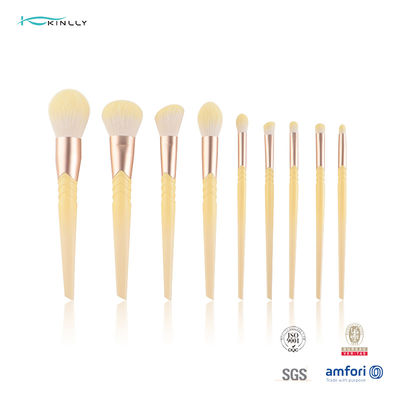 A composição plástica de 9 PCS escova o cabelo amarelo que mistura o grupo de escova cosmético